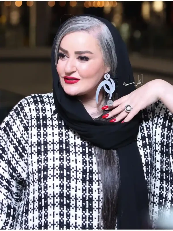 تصاویری از استایل کلاسیک «نعیمه نظامدوست» در اکران کجپیله با پالتوی چهارخانه 41 49