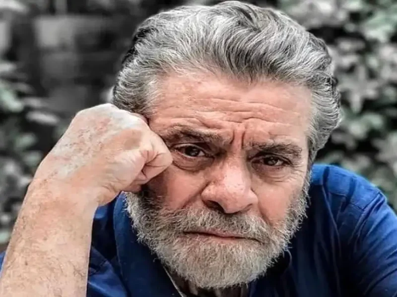 عکس قدیمی از بهروز وثوقی و نگین در حال قدم زدن تهران سال 55